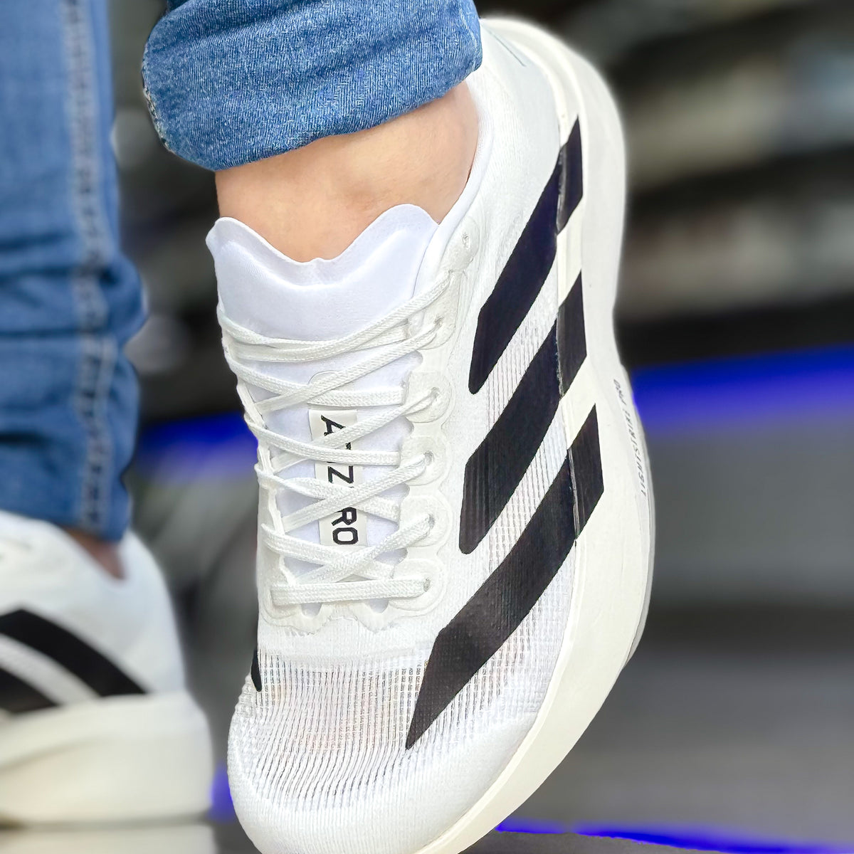 Adizero Evo SL Branco/Preto Premium