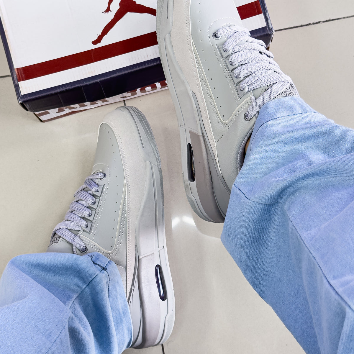 Air Jordan 4 RM Cinza Premium